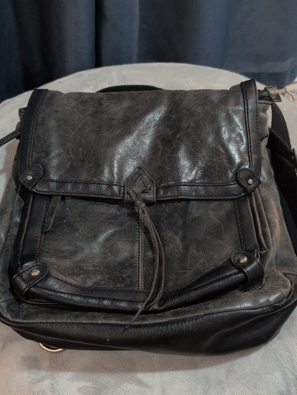 The Sak Black Leather Flap Backpack